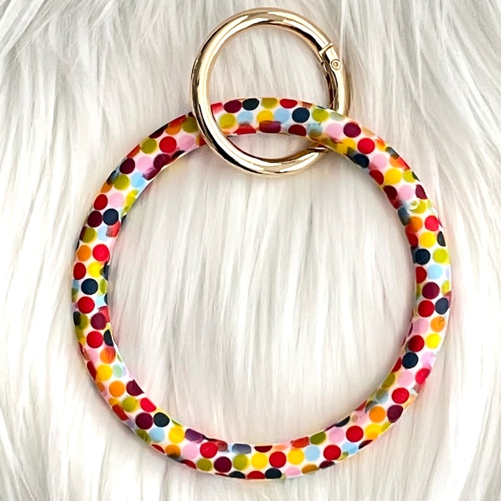 Polka Dot/ Confetti Print Silicone Ring Keychain. NWOT. New + Never Been Used.